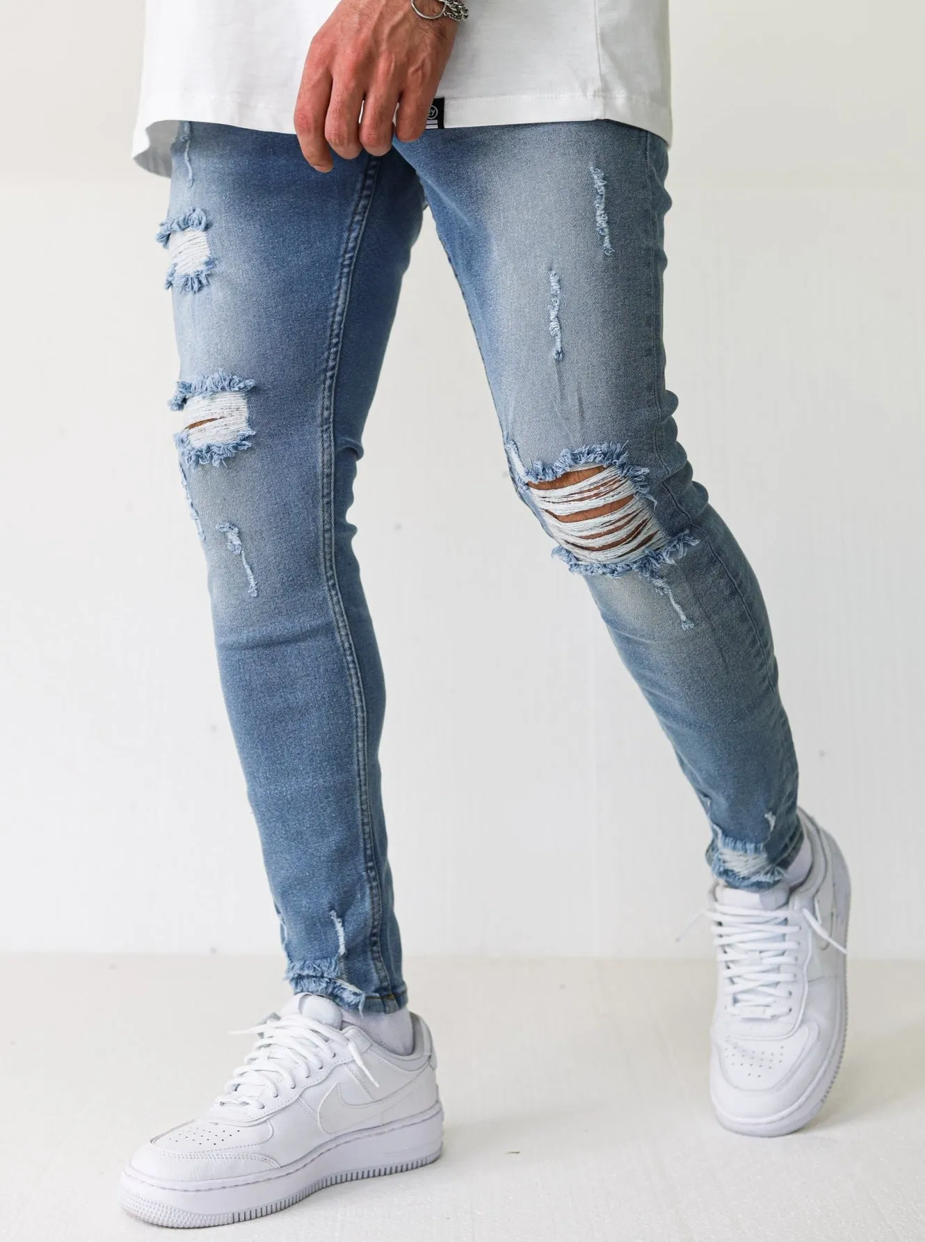 Distressed Ripped Light Blue Jeans